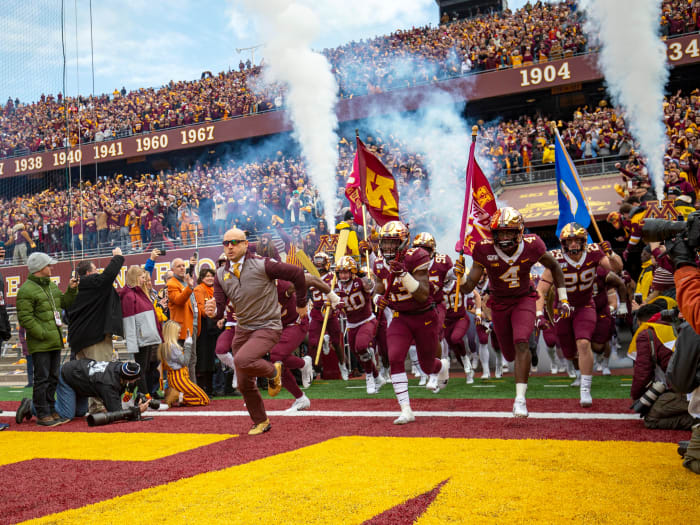 Nov 9, 2019; Minneapolis, MN, USA; Minnesota Golden Gophers head coach P.J. Fleck leads the Minnesota Golden Gophers onto the field before a game against the Penn State Nittany Lions at TCF Bank Stadium. Mandatory Credit: Jesse Johnson-USA TODAY Sports
